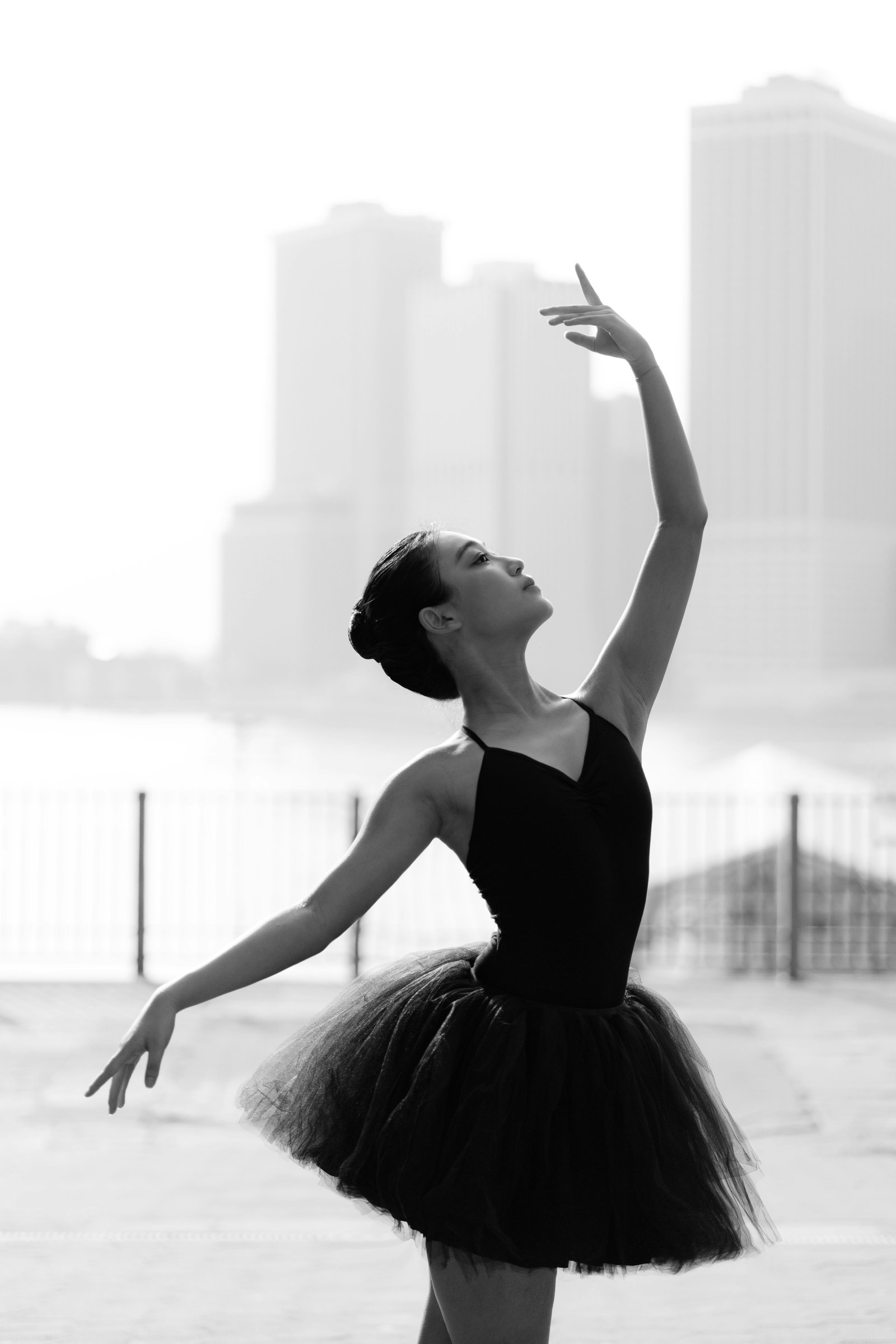 Ballerina in a black leotard and white tutu